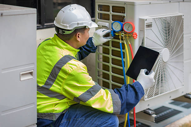 Professional Hvac technician working in Harrisburg, OH